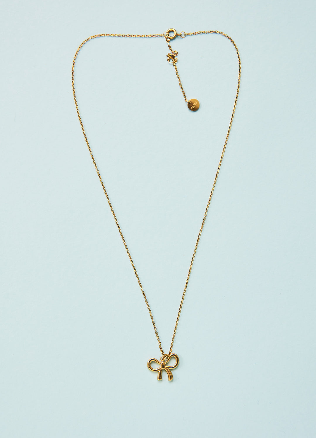 Halskæde med sløjfevedhæng