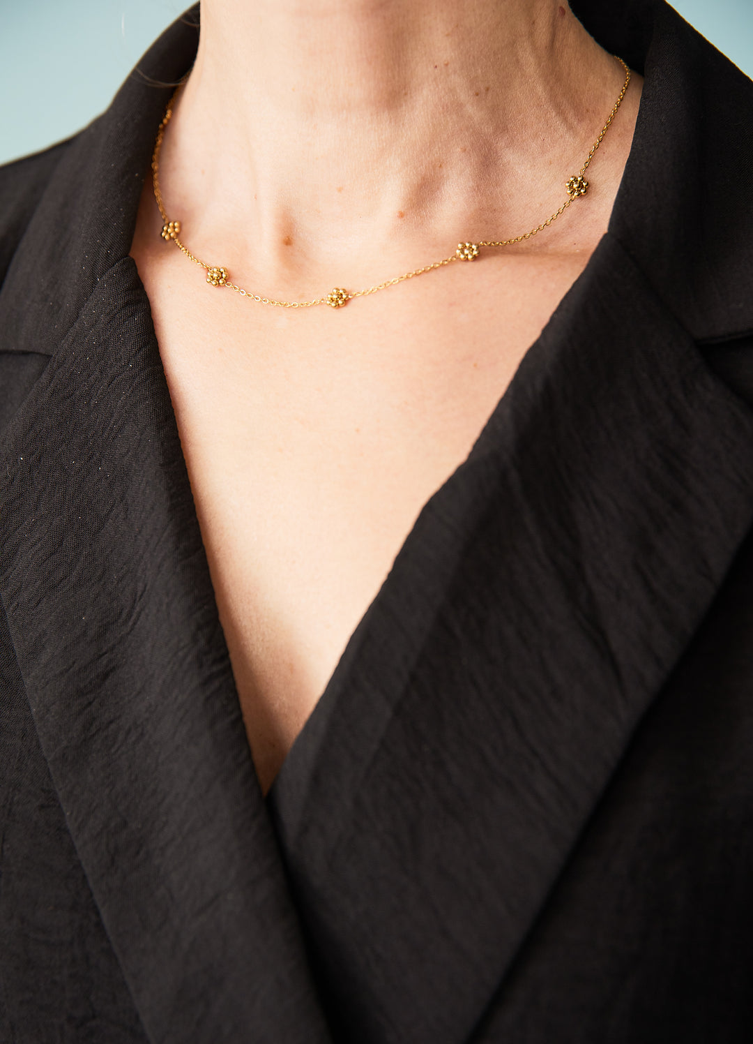 Halskæde med små blomster