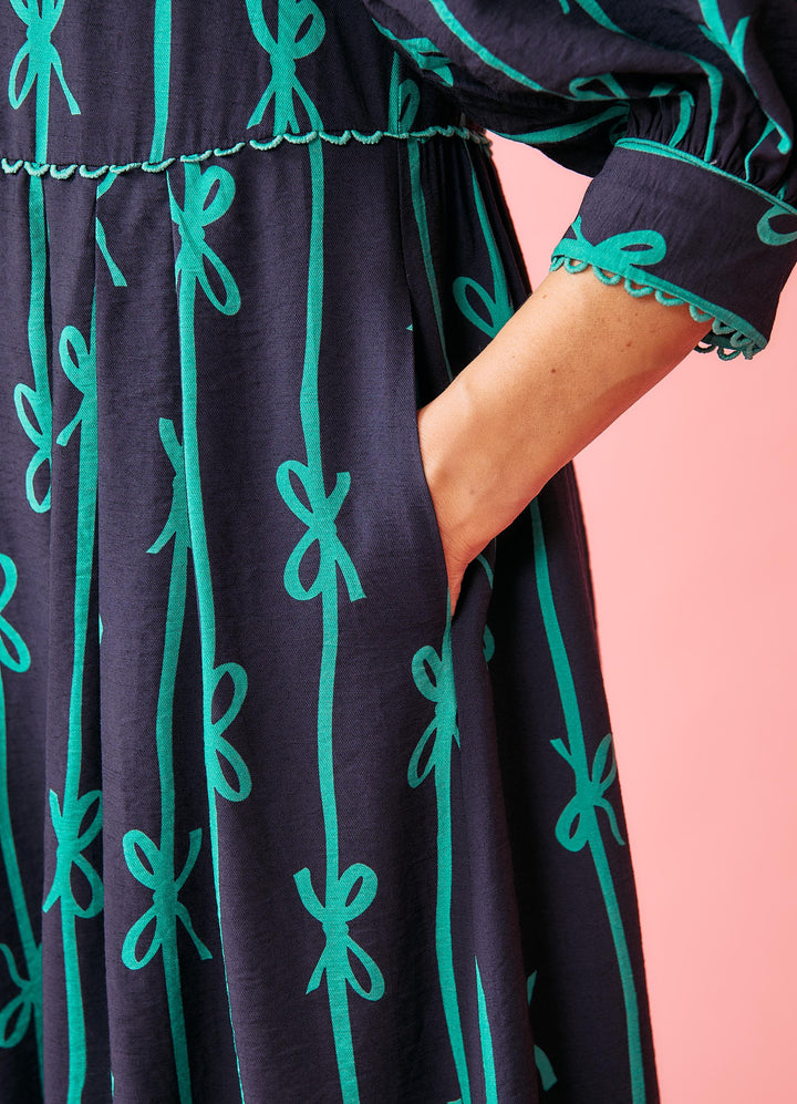 Caris Statement kjole - navy med grønne sløjfer