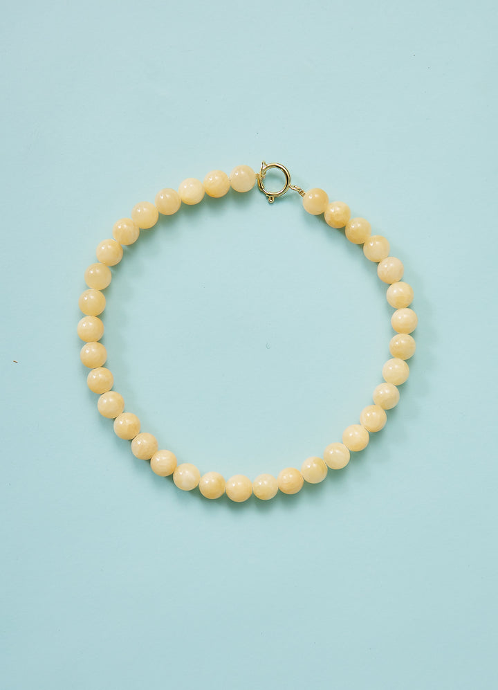 Statement perlekæde i natursten - lysegul