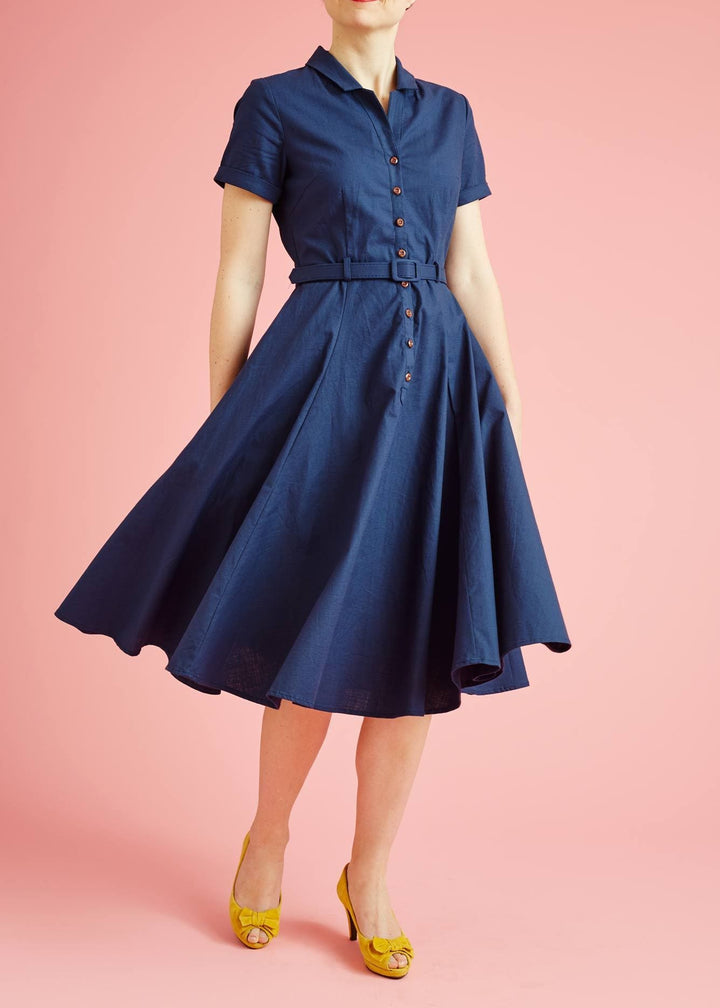 Blue shirt dress with wooden buttons and swing skirt